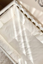 Повний комплект постільної білизни в дитяче ліжечко DreamLand, молочний