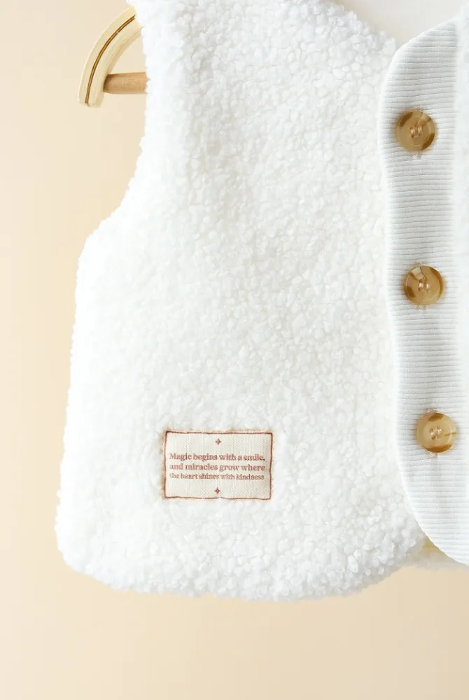 Хутряна жилетка Tino для малюків, молочна Хутряна жилетка Tino для малюків, молочна